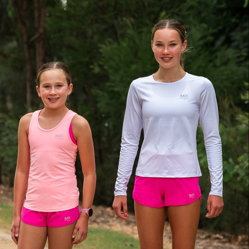 Girls white long sleeve running top